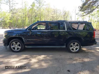 2015 Chevrolet Suburban LT with VIN 1GNSCJKC1FR264255, listed as a IAAI auction lot 42065176 with 115,861 mi miles. Bid and sale history available at carsss.com. Image 14.