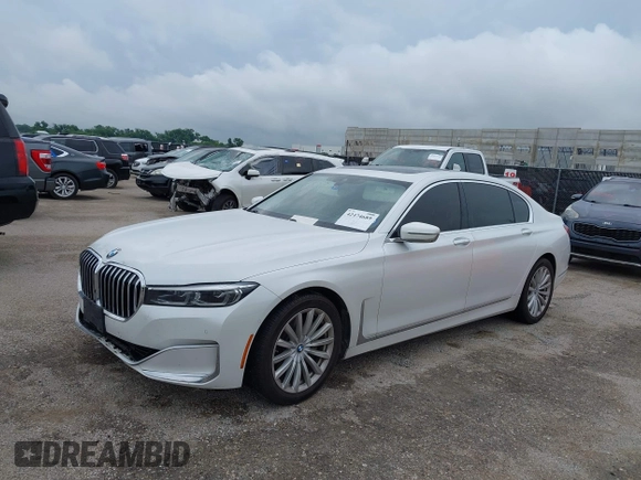 2020 BMW 7 Series 740i z VIN WBA7T2C07LCE11573, wystawiony jako IAAI lot #42474689 z przebiegiem 63 015 mil mil oraz . Historia ofert i sprzedaży dostępna na DreamBid. Obrazek 2.