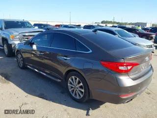 2016 Hyundai Sonata 2.4L Sport with VIN 5NPE34AF8GH407309, listed as a IAAI auction lot 41711709 with 127,460 mi miles. Bid and sale history available at carsss.com. Image 3.