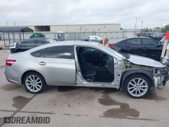 2015 Toyota Avalon Limited with VIN 4T1BK1EB2FU149980, listed as a IAAI auction lot 41897411 with 136,507 mi miles and . Bid and sale history available at DreamBid. Image 6.
