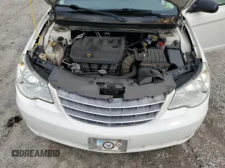 2009 Chrysler Sebring LX z VIN 1C3LC46B19N500211, wystawiony jako Copart lot #56856615 z przebiegiem 66 799 mil mil oraz Szkoda całkowita • Salvage title. Historia ofert i sprzedaży dostępna na DreamBid. Obrazek 11.