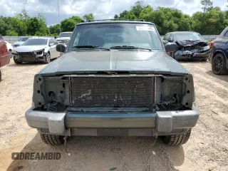 2001 Jeep Cherokee Sport with VIN 1J4FT48SX1L590135, listed as a Copart auction lot 53502945 with 362,941 mi miles and Non Repairable. Bid and sale history available at carsss.com. Image 5.