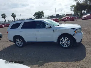2013 Dodge Durango Crew with VIN 1C4SDHDT2DC679600, listed as a IAAI auction lot 42215737 with 128,499 mi miles and . Bid and sale history available at DreamBid. Image 13.