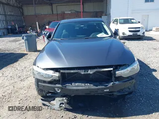 2014 BMW 3 Series 320i xDrive with VIN WBA3C3C54EP661409, listed as a IAAI auction lot 42182593 with 159,104 mi miles and . Bid and sale history available at DreamBid. Image 13.