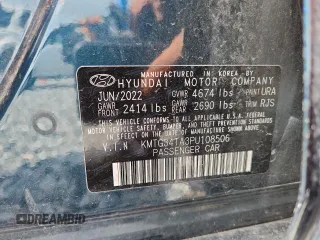2023 Genesis G70 2.0T with VIN KMTG34TA3PU108506, listed as a Copart auction lot 61137005 with 40,950 mi miles and Salvage title. Bid and sale history available at DreamBid. Image 12.