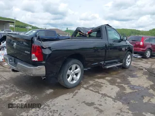2021 Ram 1500 Tradesman with VIN 3C6JR7DT4MG704279, listed as a IAAI auction lot 42212201 with 21,528 mi miles and . Bid and sale history available at DreamBid. Image 4.