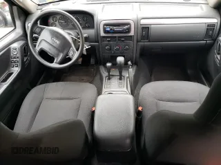 2004 Jeep Grand Cherokee Laredo with VIN 1J4GW48S94C431302, listed as a Copart auction lot 53433245 with 137,690 mi miles and Salvage Title. Bid and sale history available at carsss.com. Image 8.