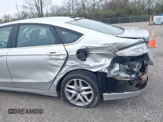 2015 Ford Fusion SE z VIN 1FA6P0H75F5112124, wystawiony jako IAAI lot #41957866 z przebiegiem 199 242 mil mil oraz . Historia ofert i sprzedaży dostępna na DreamBid. Obrazek 6.