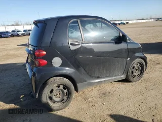 2009 Smart fortwo Pure with VIN WMEEJ31X89K287722, listed as a Copart auction lot 54266035 with 203,261 mi miles and Salvage Title. Bid and sale history available at carsss.com. Image 3.