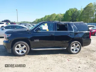 2015 Chevrolet Tahoe LT with VIN 1GNSCBKC8FR268891, listed as a IAAI auction lot 41964602 with 175,035 mi miles and . Bid and sale history available at DreamBid. Image 14.