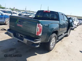 2016 GMC Canyon 4WD SLT z VIN 1GTG6DE30G1150573, wystawiony jako IAAI lot #41969678 z przebiegiem 130 197 mil mil oraz . Historia ofert i sprzedaży dostępna na DreamBid. Obrazek 4.