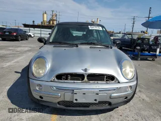 2003 MINI Hardtop with VIN WMWRC33453TE14909, listed as a Copart auction lot 65419725 with 111,960 mi miles and Salvage title. Bid and sale history available at DreamBid. Image 5.