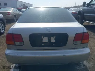 1996 Honda Civic DX with VIN 2HGEJ6627TH550103, listed as a IAAI auction lot 41710877 with 142,608 mi miles. Bid and sale history available at carsss.com. Image 16.