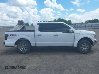 2018 Ford F-150 XL with VIN 1FTEW1E50JKC91068, listed as a IAAI auction lot 42221345 with 135,095 mi miles and . Bid and sale history available at DreamBid. Image 13.