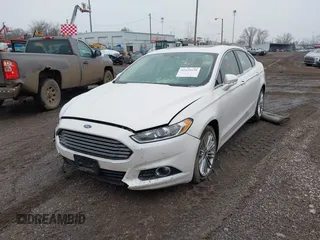 2015 Ford Fusion SE z VIN 3FA6P0HD1FR180083, wystawiony jako IAAI lot #41535579 z przebiegiem 109 363 mil mil oraz . Historia ofert i sprzedaży dostępna na DreamBid. Obrazek 12.