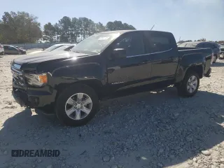 2015 GMC Canyon 2WD SLE with VIN 1GTG5BEA6F1221120, listed as a Copart auction lot 77391484 with 180,334 mi miles and Salvage Title. Bid and sale history available at carsss.com. Image 1.