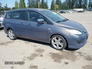 2009 Mazda Mazda5 Sport with VIN JM1CR293890352218, listed as a IAAI auction lot 42121590 with 168,302 mi miles. Bid and sale history available at carsss.com. Image 1.