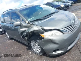 2011 Toyota Sienna XLE AAS with VIN 5TDYK3DC7BS123412, listed as a IAAI auction lot 42230504 with 209,998 mi miles and . Bid and sale history available at DreamBid. Image 1.