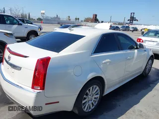 2010 Cadillac CTS with VIN 1G6DA5EG7A0135451, listed as a IAAI auction lot 41964313 with 136,172 mi miles and . Bid and sale history available at DreamBid. Image 4.