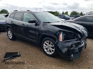 2014 Jeep Cherokee Latitude with VIN 1C4PJLCSXEW320764, listed as a Copart auction lot 83899244 with 140,904 mi miles and Salvage Title. Bid and sale history available at carsss.com. Image 4.