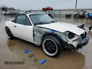 1994 Mazda MX-5 Miata with VIN JM1NA353XR0502129, listed as a Copart auction lot 42827275 with Not provided miles and Salvage title. Bid and sale history available at DreamBid. Image 4.