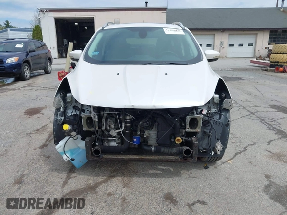 2016 Ford Escape Titanium with VIN 1FMCU9J98GUA00832, listed as a IAAI auction lot 42188941 with 90,764 mi miles and . Bid and sale history available at DreamBid. Image 6.