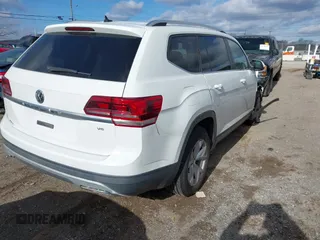 2018 Volkswagen Atlas Launch Edition with VIN 1V2BR2CA5JC513354, listed as a IAAI auction lot 41205605 with 99,793 mi miles and . Bid and sale history available at DreamBid. Image 4.
