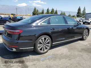 2022 Audi A8 with VIN WAULDAF86NN001617, listed as a Copart auction lot 63068504 with 25,974 mi miles and Salvage Title. Bid and sale history available at carsss.com. Image 3.