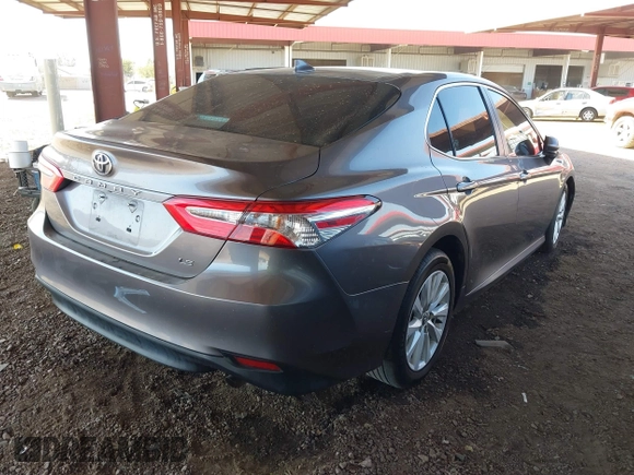2020 Toyota Camry LE with VIN 4T1C11AK6LU919672, listed as a IAAI auction lot 41726103 with 66,367 mi miles. Bid and sale history available at carsss.com. Image 4.