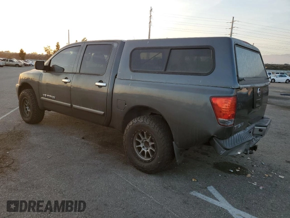 2007 Nissan Titan XE with VIN 1N6AA07A07N217705, listed as a Copart auction lot 86836804 with 272,228 mi miles and Salvage Title. Bid and sale history available at DreamBid. Image 2.