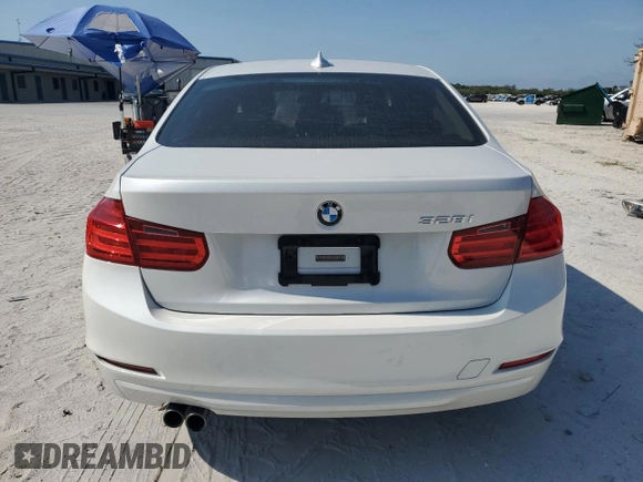 2013 BMW 3 Series 328i z VIN WBA3A5G58DNP26803, wystawiony jako Copart lot #57305995 z przebiegiem 106 590 mil mil oraz Szkoda całkowita • Salvage title. Historia ofert i sprzedaży dostępna na DreamBid. Obrazek 6.