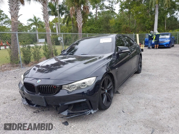 2015 BMW 4 Series 435i with VIN WBA4B1C5XFD955119, listed as a IAAI auction lot 41349918 with 181,937 mi miles and . Bid and sale history available at carsss.com. Image 12.