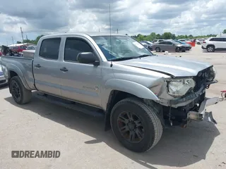2015 Toyota Tacoma PreRunner with VIN 5TFKU4HN7FX005863, listed as a IAAI auction lot 39727843 with 137,667 mi miles and . Bid and sale history available at DreamBid. Image 1.
