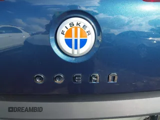2023 Fisker Ocean Ultra z VIN VCF1UBU23PG009115, wystawiony jako IAAI lot #41532344 z przebiegiem Nie podano mil oraz . Historia ofert i sprzedaży dostępna na DreamBid. Obrazek 22.