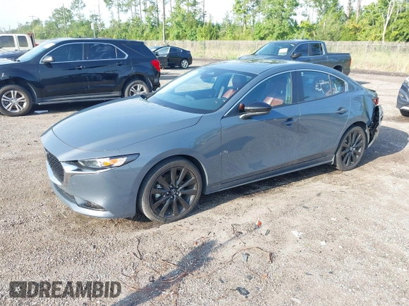 2024 Mazda 3 S Carbon Edition with VIN 3MZBPBCM6RM411828, listed as a IAAI auction lot 42802141 with 40,061 mi miles and . Bid and sale history available at DreamBid. Image 20.