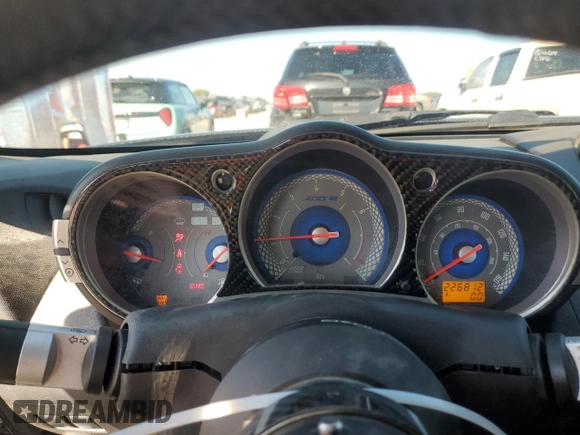 2005 Nissan 350Z with VIN JN1AZ34D05M608841, listed as a Copart auction lot 70408954 with 226,812 mi miles and Salvage Title. Bid and sale history available at DreamBid. Image 9.