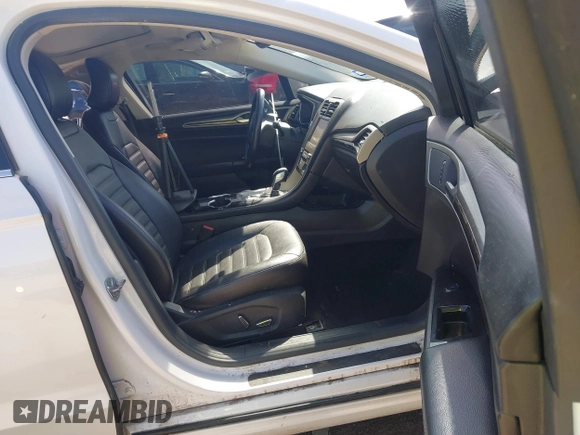 2016 Ford Fusion SE with VIN 3FA6P0T97GR239612, listed as a IAAI auction lot 42009642 with 156,659 mi miles and . Bid and sale history available at DreamBid. Image 5.