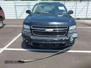 2011 Chevrolet Suburban LT with VIN 1GNSKJE34BR151246, listed as a IAAI auction lot 42520210 with 239,240 mi miles and . Bid and sale history available at DreamBid. Image 6.