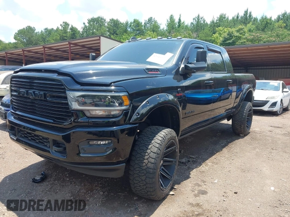 2020 Ram 2500 Laramie with VIN 3C6UR5NL9LG163597, listed as a IAAI auction lot 42545909 with Not provided miles and . Bid and sale history available at DreamBid. Image 2.
