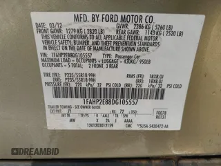 2013 Ford Taurus SEL with VIN 1FAHP2E88DG105557, listed as a IAAI auction lot 42040773 with 157,705 mi miles and . Bid and sale history available at carsss.com. Image 9.