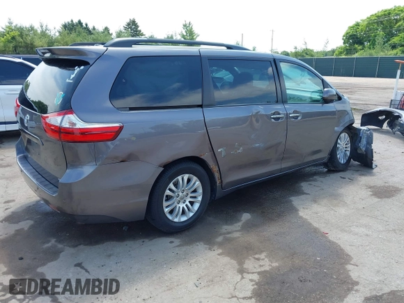 2015 Toyota Sienna XLE with VIN 5TDYK3DCXFS633128, listed as a IAAI auction lot 42527073 with 149,926 mi miles and . Bid and sale history available at DreamBid. Image 4.