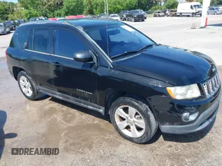 2013 Jeep Compass Sport with VIN 1C4NJCBB5DD103013, listed as a IAAI auction lot 41885936 with 169,402 mi miles. Bid and sale history available at carsss.com. Image 1.
