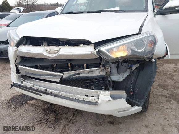 2020 Toyota 4Runner SR5 with VIN JTEBU5JR2L5822163, listed as a IAAI auction lot 41352311 with 100,418 mi miles. Bid and sale history available at carsss.com. Image 6.