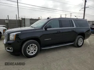2018 GMC Yukon XL SLT with VIN 1GKS1GKC1JR333119, listed as a Copart auction lot 73250134 with 77,470 mi miles and Salvage Title. Bid and sale history available at carsss.com. Image 1.