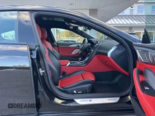 2020 BMW 8 Series M850i with VIN WBAGV8C08LBP48642, listed as a IAAI auction lot 41346377 with 141,651 mi miles. Bid and sale history available at carsss.com. Image 5.