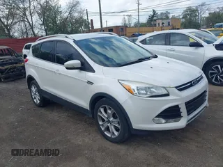 2015 Ford Escape Titanium with VIN 1FMCU0J93FUC23760, listed as a IAAI auction lot 42172281 with 146,050 mi miles and . Bid and sale history available at DreamBid. Image 1.