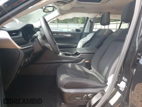 2023 Jeep Grand Cherokee Laredo with VIN 1C4RJGAG0PC534682, listed as a Copart auction lot 56981675 with 16,749 mi miles and Salvage title. Bid and sale history available at DreamBid. Image 7.