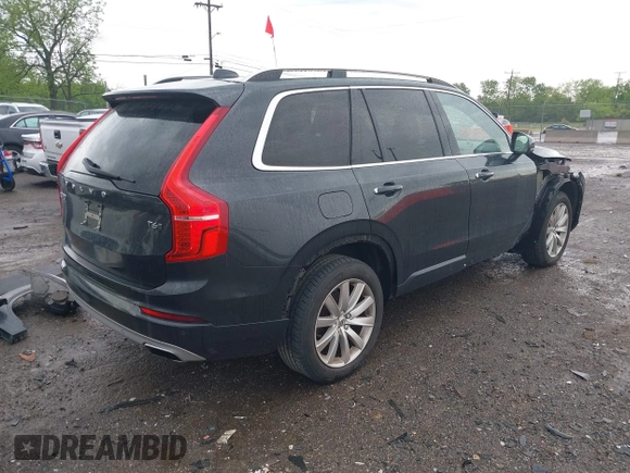 2016 Volvo XC90 T6 Momentum with VIN YV4A22PK7G1074115, listed as a IAAI auction lot 42083321 with 150,135 mi miles. Bid and sale history available at carsss.com. Image 4.