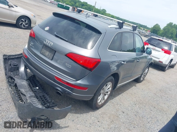2016 Audi Q5 Premium with VIN WA1C2AFP1GA003182, listed as a IAAI auction lot 42267895 with 74,086 mi miles and . Bid and sale history available at DreamBid. Image 4.