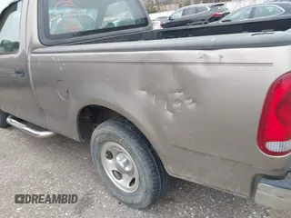 2002 Ford F-150 XL with VIN 3FTRF17212MA23970, listed as a IAAI auction lot 40991449 with 216,487 mi miles. Bid and sale history available at carsss.com. Image 13.